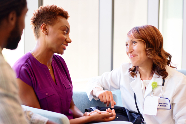 Doctor talking to patient